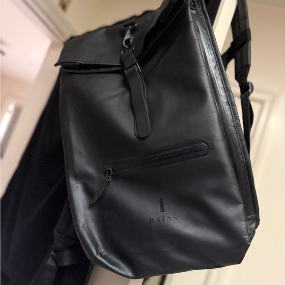 Rains Sleek Black Backpack
